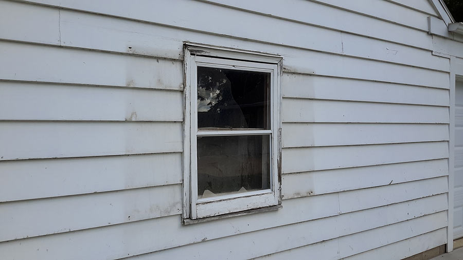 A lot of evident external siding wear and tear